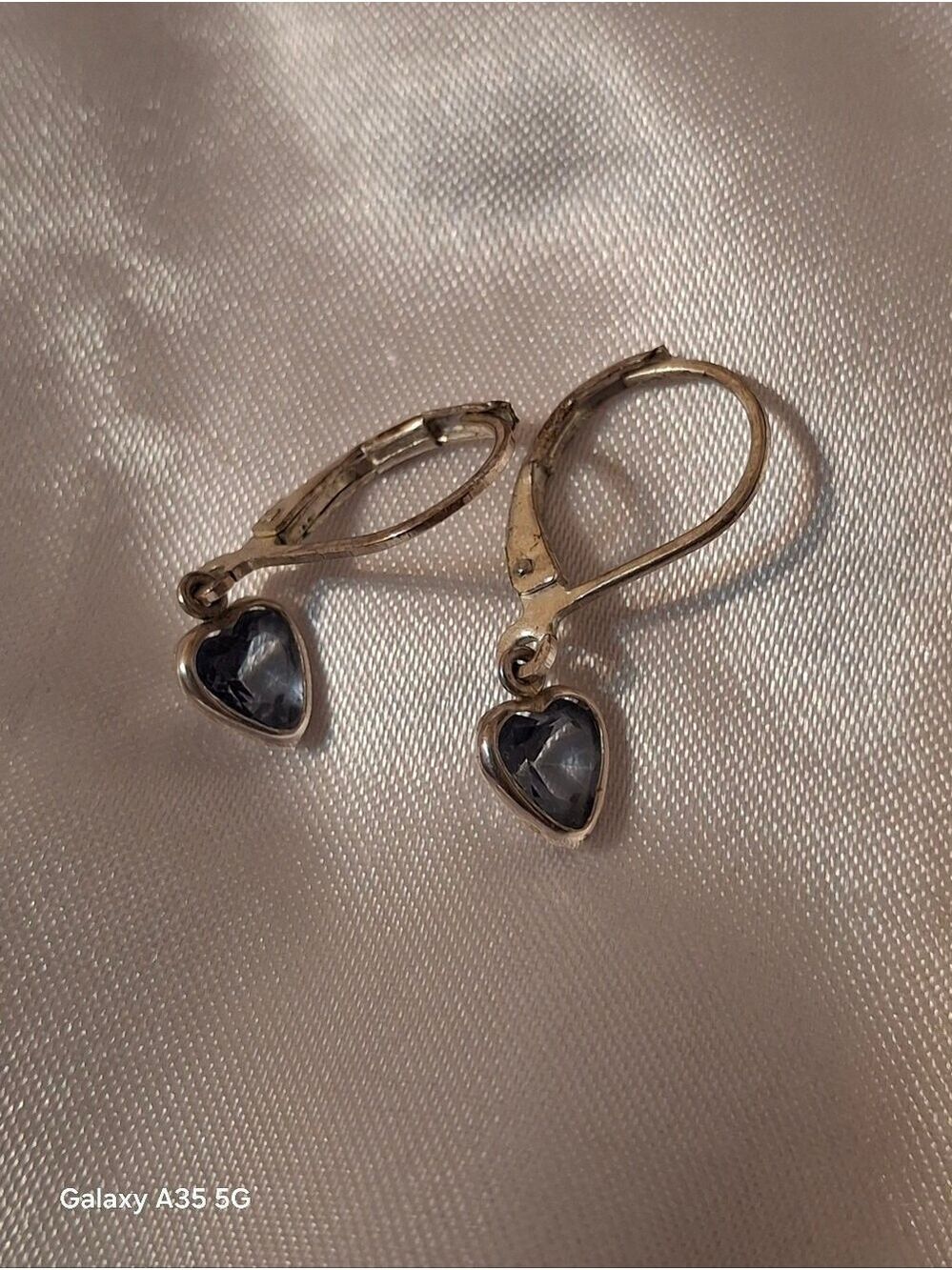 Blue topaz heart shaped stones set in sterling silver